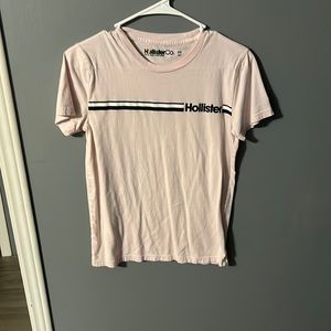 light pink t-shirt with black and white stripes